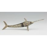 A continental white metal articulated swordfish, the body with all over textured finish,