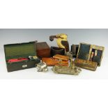 A green leatherette 'Sealing Set' box with contents, 21cm wide,