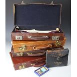 Four Masonic suitcases each containing Masonic garments and collars,