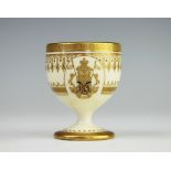 An unusual late 19th century Coalport egg cup,