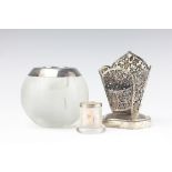 A continental white metal spill and match stick holder, of blossoming pierced design,