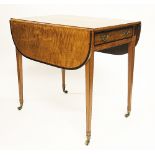 A George III inlaid satinwood Pembroke table, with drawer and rounded leaves,