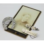 A Victorian Good Luck silver horseshoe brooch,
