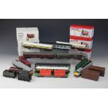 A collection of model trains and wagons, different makers and trade names, all un-boxed,
