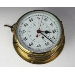 A lacquered brass bulkhead time piece,