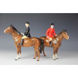 A Beswick Huntsman and Huntswoman, each on bay horses,