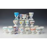A collection of nineteen 19th century egg cups, mostly Minton,