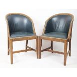 A set of four early 20th century oak tub chairs, with brass studded upholstery, on tapered legs,