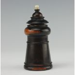 A Coombs and Co lignum vitae vesta, striker and go-to-bed, designed in chess piece form,