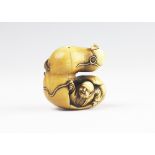 A Japanese carved ivory netsuke, Meiji period 1868-1912,