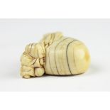 A 19th century Japanese carved ivory netsuke, Edo period, Karako with treasure bag, unsigned, 4.