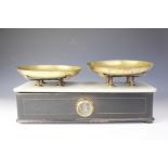 An Edwardian set of balance scales, with marble top and painted pine base, 49cm wide,
