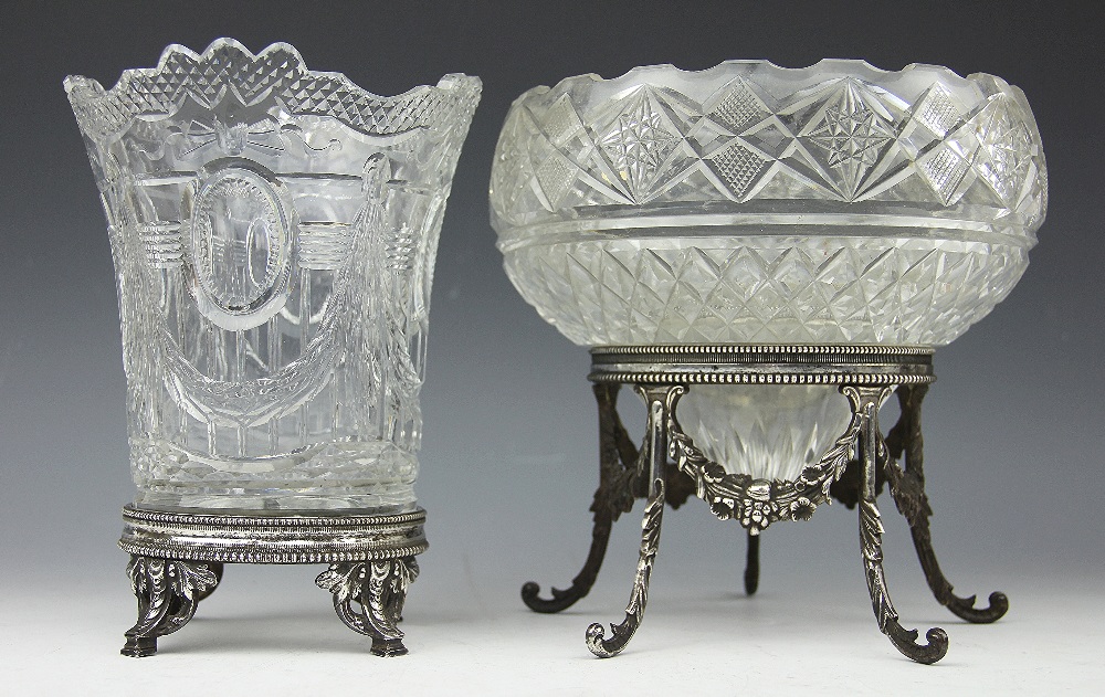 A 19th century cut glass centre piece bowl, on silver plated stand cast with floral swags,