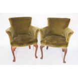 Three early 20th century tub chairs, with green upholstery,