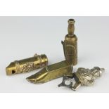 Four novelty combination vestas, comprising; a plated brass clown with legs designed as cutters 7.