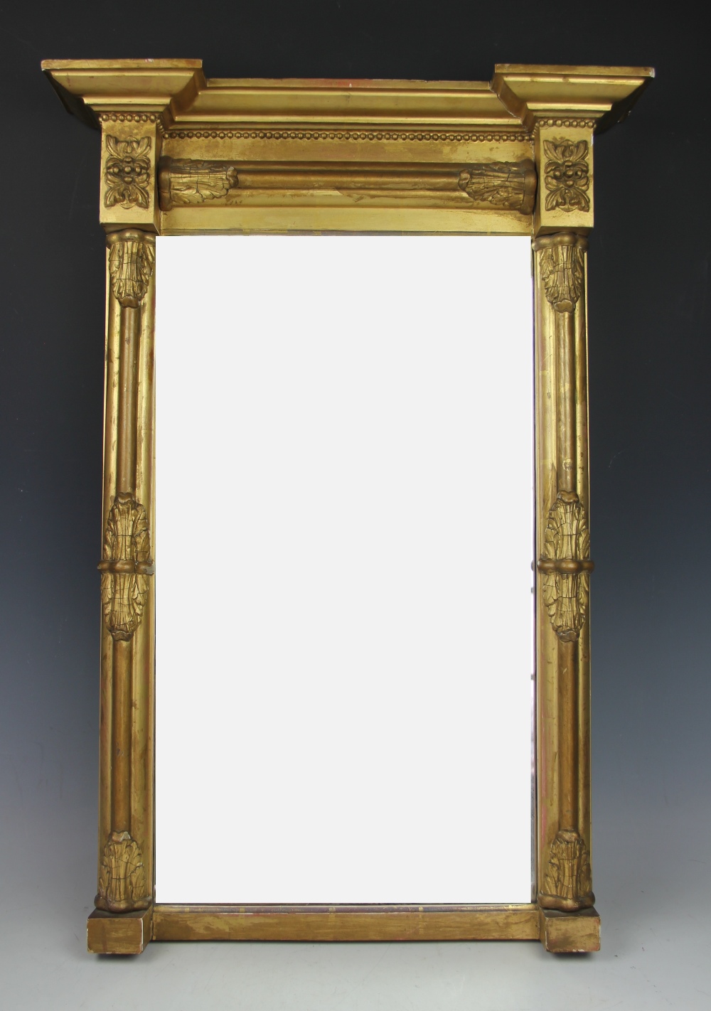 A Regency gilt wood and gesso pier mirror, decorated with acanthus leaf pilasters, 75.