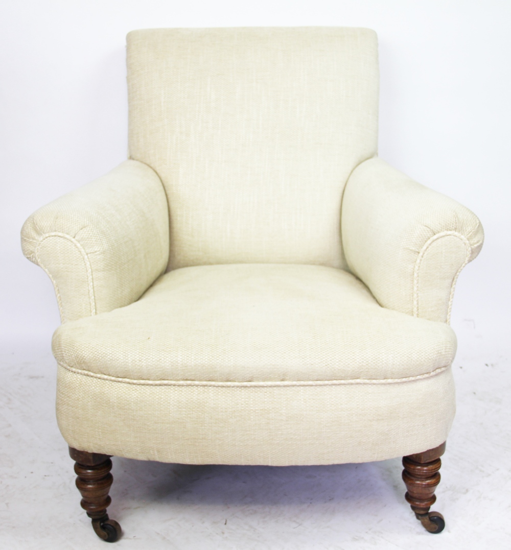 A pair of Edwardian club type chairs, with beige upholstery, on turned legs and fitted casters, - Image 2 of 2