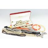 A selection of jewellery to include; a graduated garnet bead necklace with marcasite set clasp,