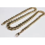 A 9ct yellow gold graduated curb link albert chain, with attached swivel clasp, 46cm long,