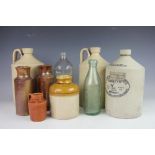 A collection of 19th century and later stoneware bottles and jars,