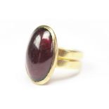 A cabochon garnet ring,