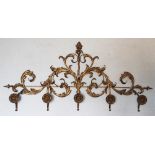 A Regency style gilt metal wall bracket, decorated throughout with scrolling acanthus leaves,