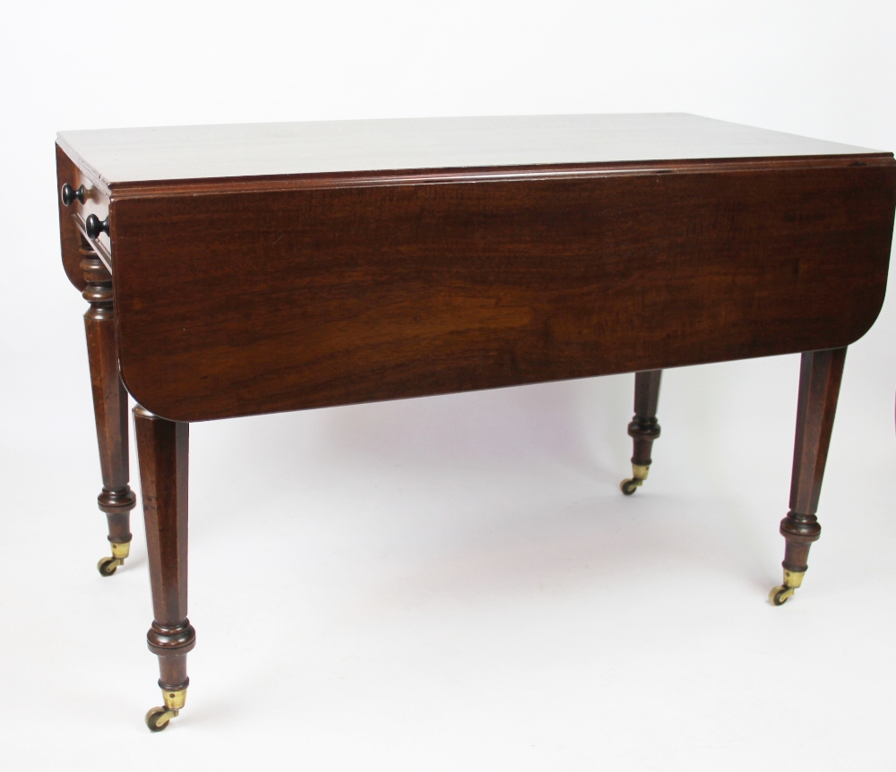 A William IV mahogany Pembroke table, with one real and one dummy drawer,