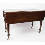 A William IV mahogany Pembroke table, with one real and one dummy drawer,