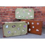 Two 1940's vintage tan leather and green canvas suit cases, 67cm long,