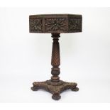 A Victorian carved oak planter, of octagonal form on spiral column, platform and flower head feet,