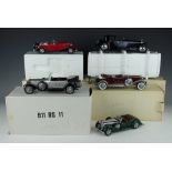 Five Franklin Mint scale model cars, comprising a 1938 Alvis 4.