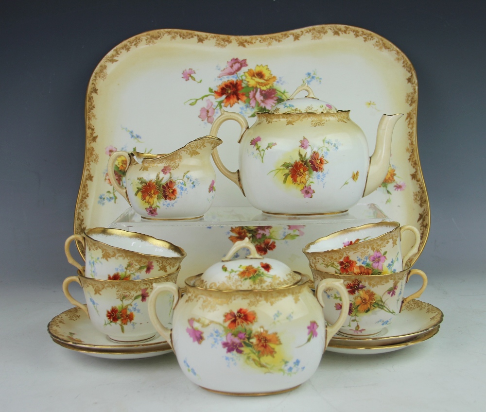 A Doulton Burslem florally decorated tea service with tray, to include; tea pot and cover, - Image 2 of 2