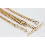A 15ct yellow gold double albert chain necklace, of uniform curb link,