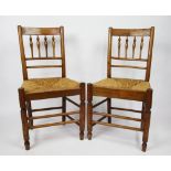 A pair of 19th century ash country kitchen chairs, with rush seats, with two walnut kitchen chairs,