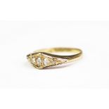 A five stone diamond ring, Birmingham 1916, the five graduated diamonds within kite shaped setting,