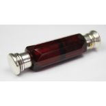 A Victorian double ended ruby glass and white metal mounted scent bottle,