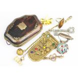 A Victorian tortoiseshell and pique work purse, inset with a shield initialled 'JS', 7cm wide,