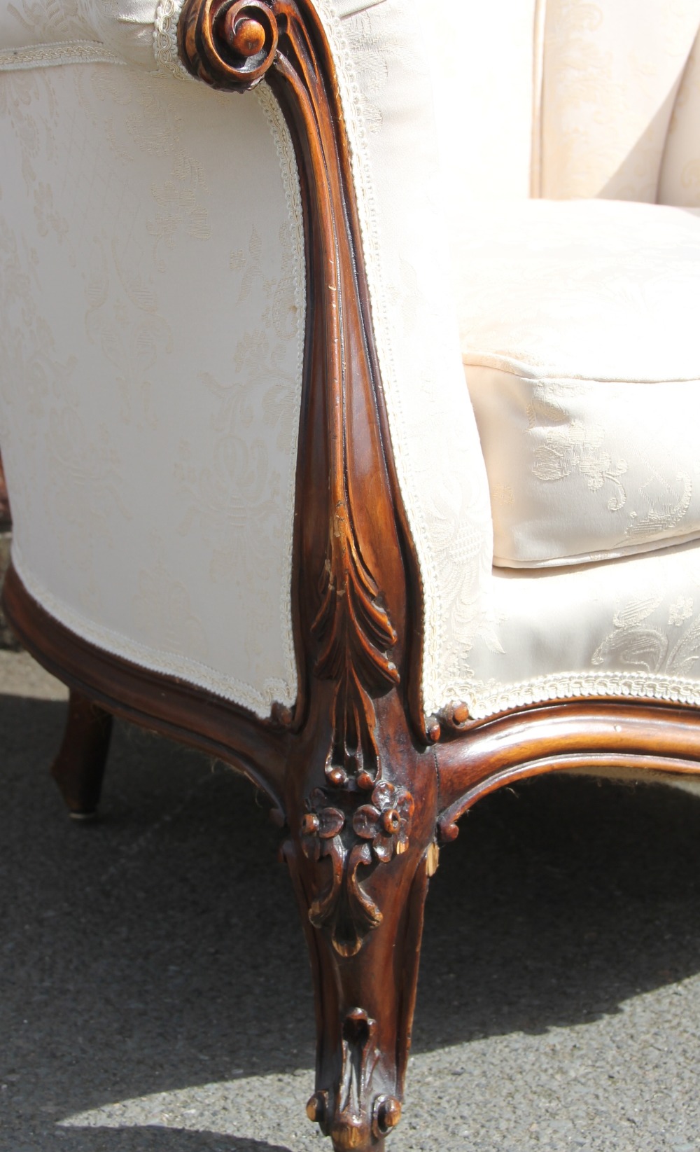 A French Louis XVI style carved and stained walnut salon suite, with floral ivory upholstery, - Image 5 of 7