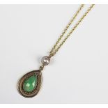 A jade and mabe pearl set pendant and attached chain,
