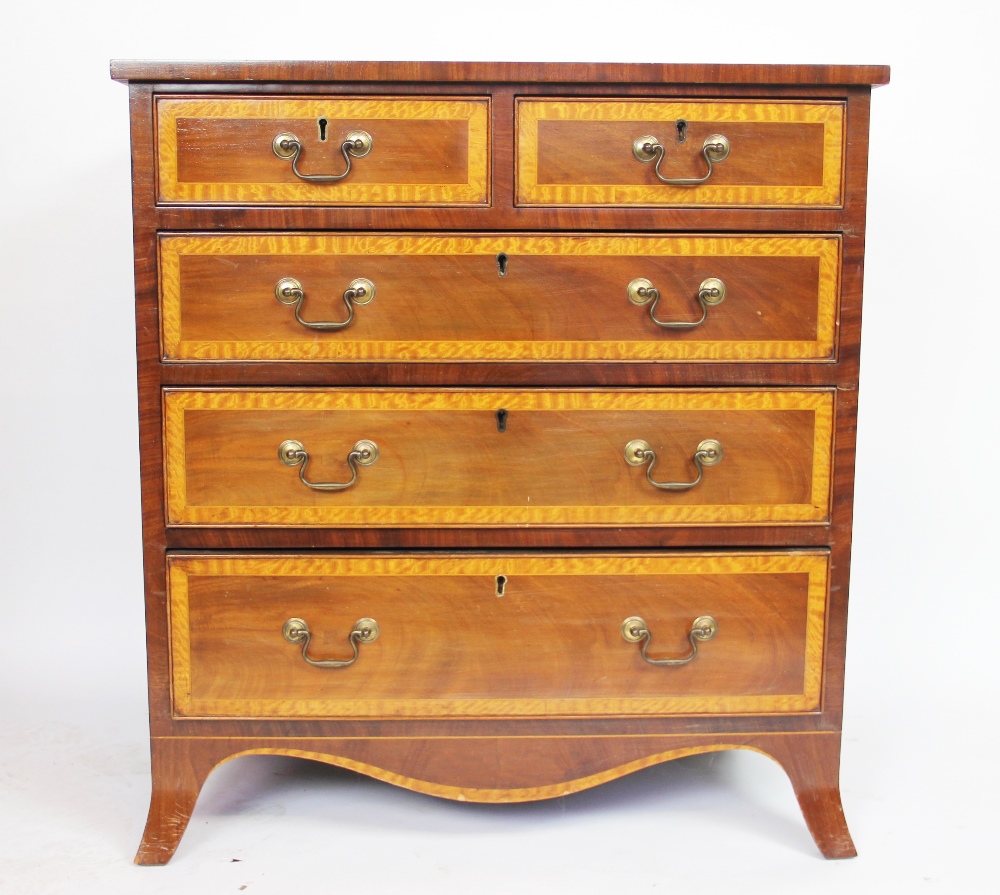 An Edwardian style satinwood inlaid mahogany chest, of two short and three graduated long drawers,