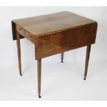 A late George III mahogany Pembroke table, with geometric veneered top, above a drawer,