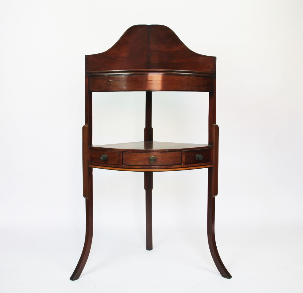 A George III mahogany bow front corner wash stand, with drawer, 109cm H,