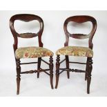 A set of six late Victorian stained beech dining chairs, with upholstered seats,