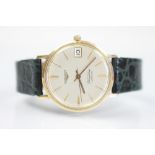 A gentlemans Longines Flagship Automatic 9ct gold wristwatch, the champagne dial with gilt batons,