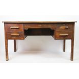 A 20th century oak office desk with two drawers, on square legs, 76cm H x 135cm W x 75cm D,