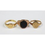 A bloodstone set gold signet ring and a 9ct gold signet ring,