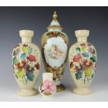 A small Moorcroft Magnolia pattern vase, decorated with flowers against an ivory ground, 10.