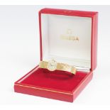 A ladies 18ct yellow gold Omega wristwatch,