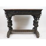 A Victorian carved oak centre table, of 16th century style, with lion mask corner detailing,