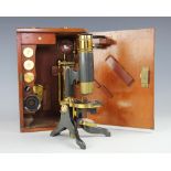 A late 19th century lacquered brass monocular microscope,